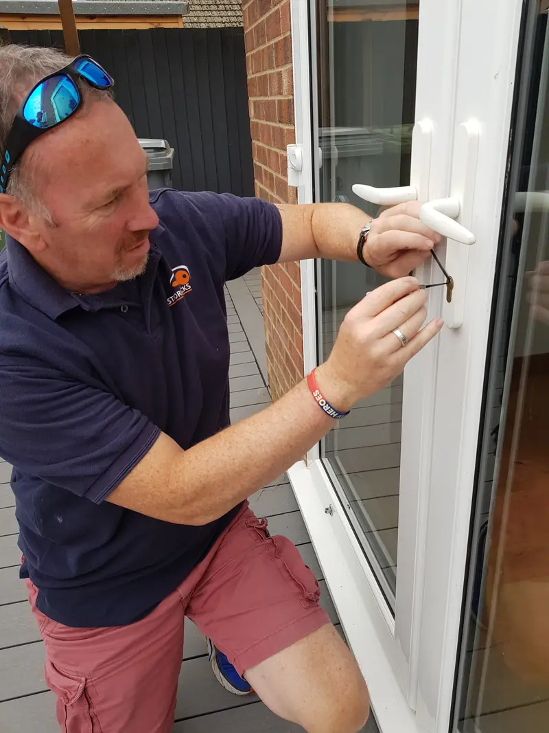 Kevin picking a uPVC patio door lock First For Locks Acle